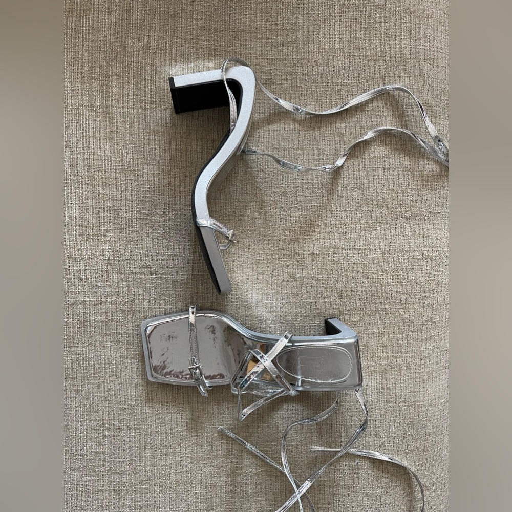 Brand new silver wrap around heels size 39